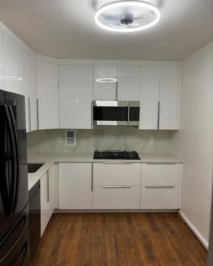 Renovated kitchen with quartz countertops in East Milton